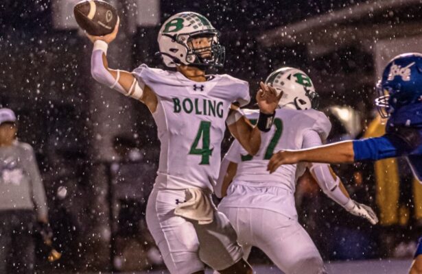 Boling quarterback Jace Urbanek prepares to pass in the rain against Rice Consolidated on October 2, 2026.
